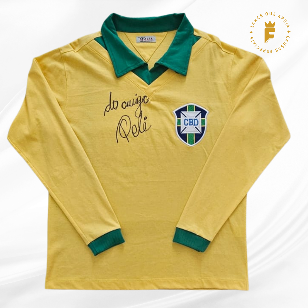 Camisa reedição Seleção Brasileira Copa de 1962, amarela, licenciada oficial Athleta, 7 Garrincha. Autografada pelo Rei Pelé. 